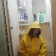 Thefetishgirl: Switch Rainwear in Shower