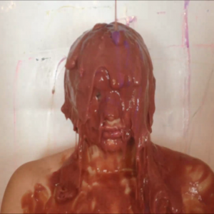 CandyCustard: Penny Lee covered in chocolate sauce from the gunge tank