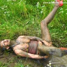 WSMProductions: Mrs. CC in Mud Slut 3 down and dirty in an open field--wsm