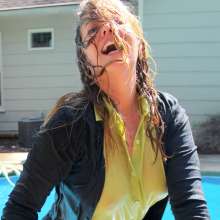 April Showers Wetlook: New Video!  Black Cardigan, Yellow Blouse, Skirt and Boots in Pool