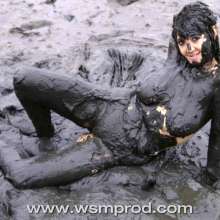 WSMProductions: Debbie has a seaside mudbath in her office suit and blouse  -wsm