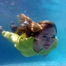 April Showers Wetlook: New Video!  Black Cardigan, Yellow Blouse, Skirt and Boots in Pool