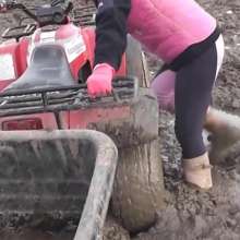 bootedbabes: Working on My ATV in Deep Mud