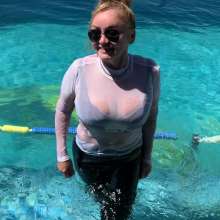 Wet_look_elena: Latex Pants and Big Boots in the Pool
