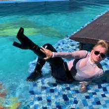 Wet_look_elena: Latex Pants and Big Boots in the Pool