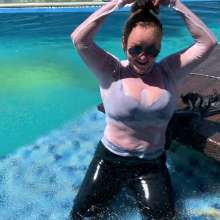 Wet_look_elena: Latex Pants and Big Boots in the Pool