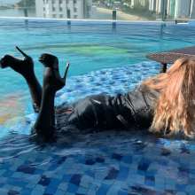 Wet_look_elena: Leather Outfit in the Pool