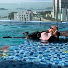 Wet_look_elena: Leather Outfit in the Pool