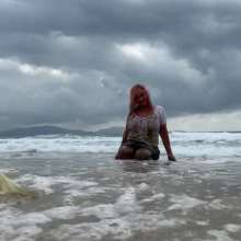 Wet_look_elena: Leather Skirt and Stockings in the Sea