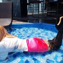 Wet_look_elena: Pink Skirt in Pool