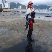 Wet_look_elena: Red Latex Pants in Mud