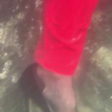 Wet_look_elena: Red Latex Pants in the Sea