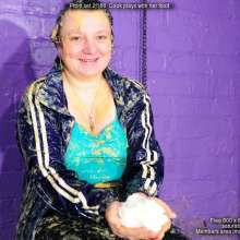 DungeonMasterOne: Evelyne the cook plays with her food, in rainwear!