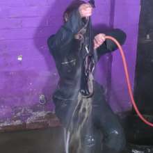 DungeonMasterOne: Maude washes the wellies and gets drenched in the process!
