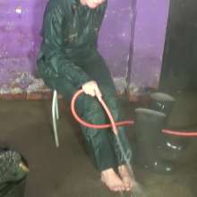 DungeonMasterOne: Maude washes the wellies and gets drenched in the process!