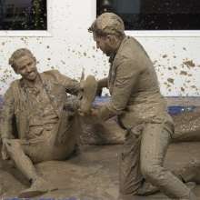 WamtasticUK: Adam and James Wedding Suits Mud Wrestle