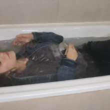 lovingmessy4you: Wetlook in the Bathtub Wearing Jean Jacket and Socks