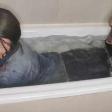 lovingmessy4you: Wetlook in the Bathtub Wearing Jean Jacket and Socks