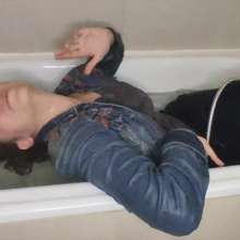 lovingmessy4you: Wetlook in the Bathtub Wearing Jean Jacket and Socks
