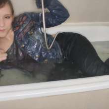 lovingmessy4you: Wetlook in the Bathtub Wearing Jean Jacket and Socks