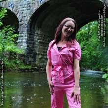 DungeonMasterOne: Lucia goes swimming in a pink Barbiecore boilersuit!