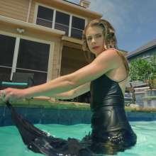 WetlookFashion: Joy in the Pool Wearing a Sexy Black Satin Dress