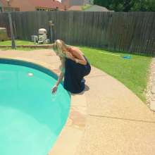 WetlookFashion: Joy in the Pool Wearing a Sexy Black Satin Dress