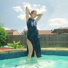 WetlookFashion: Joy in the Pool Wearing a Sexy Black Satin Dress