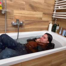 Wet Live Team: Margarita Is Wet in Her Coat, Fully-dressed, Full Bath