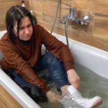 Wet Live Team: Margarita Is Wet in Her Coat, Fully-dressed, Full Bath