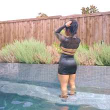 WetlookFashion: Maria Gets Wet in a Sexy Mini Skirt and a Sheer Crop Top