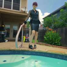 WetlookFashion: Petra Gets Wet in Latex and Leather