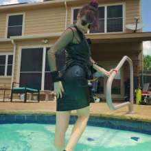 WetlookFashion: Petra Gets Wet in Latex and Leather
