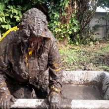 Darkabyss445: Soaking in Mud in My Rainwear