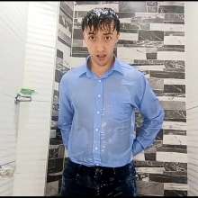 WETColours: Luke in the Shower with a Light Blue Shirt