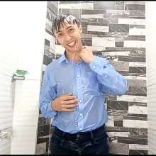 WETColours: Luke in the Shower with a Light Blue Shirt