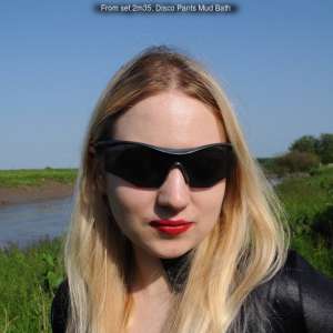DungeonMasterOne: Blonde Felicity takes a mud-bath in genuine American Apparel disco pants!