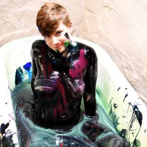 Stella: Stella paints her naked body in tub full of gunge.