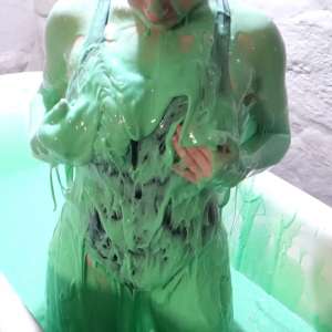 Stella: Stella bathes in a tub filled with 30 gallons of green gunge.
