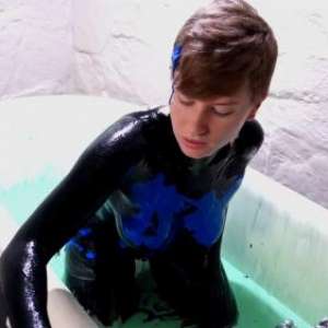 Stella: Stella paints her naked body in tub full of gunge.