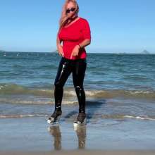 Wet_look_elena: Black Latex Pants and Red Top in the Sea