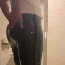 Wet_look_elena: Black Latex Pants in Shower