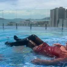 Wet_look_elena: Dress in Pool with Big Boots