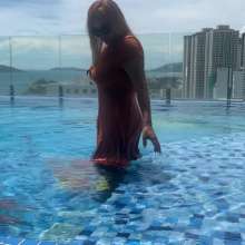 Wet_look_elena: Dress in Pool with Big Boots