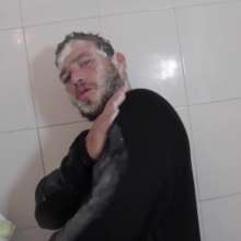 lovingmessy4you: Wetlook in the Shower Wearing Jacket, Sweater and Bluejeans