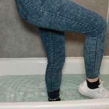 AuroraWetlook: Redhead Soaked in Sneakers, Jeans and a Jumper!