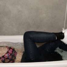 AuroraWetlook: Redhead Soaked in Sneakers, Jeans and a Jumper!