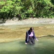 Wet_look_elena: Vika in the River Wearing Jacket