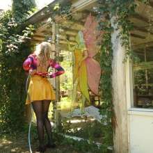 eileenvogel: W383 Eileen in party outfit dancing in the garden