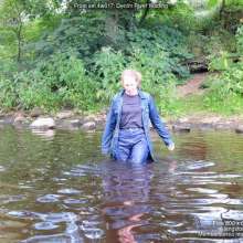 DungeonMasterOne: Purity wades into the river in jeans and a denim coat!
